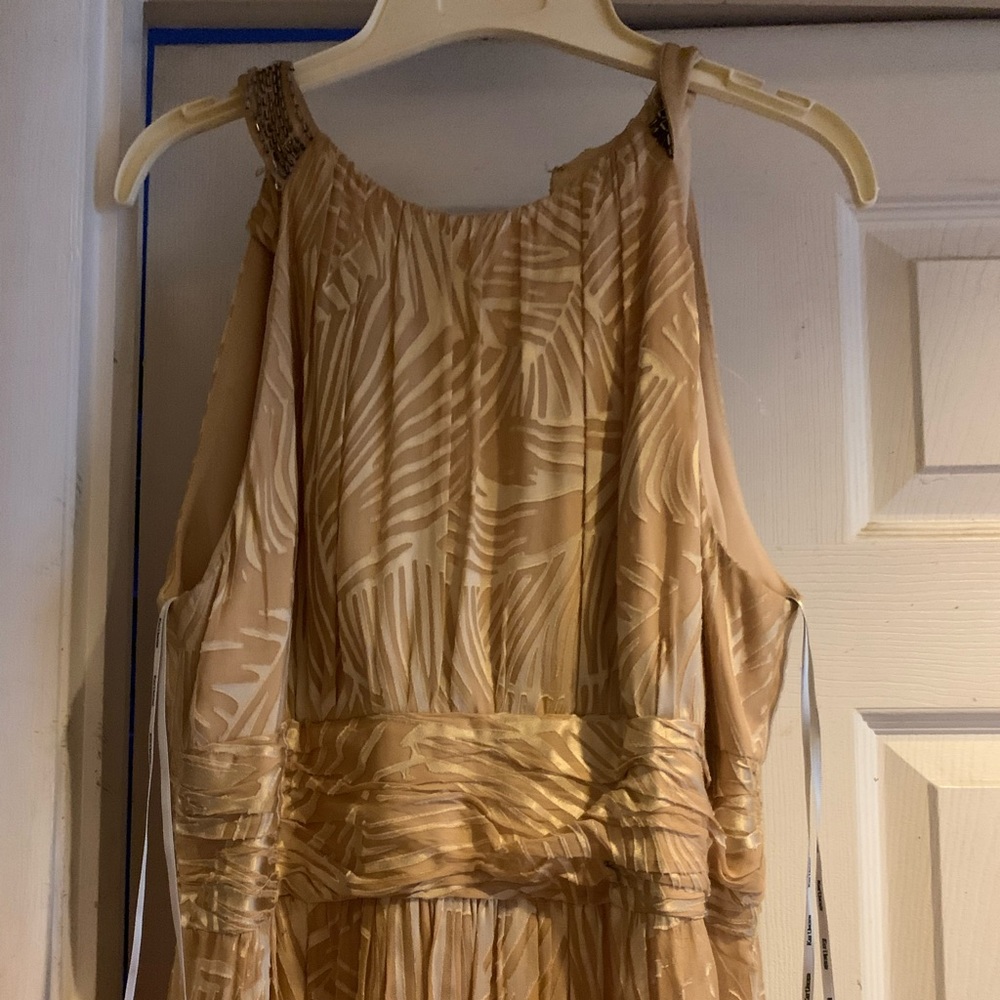 Cream colored gown.